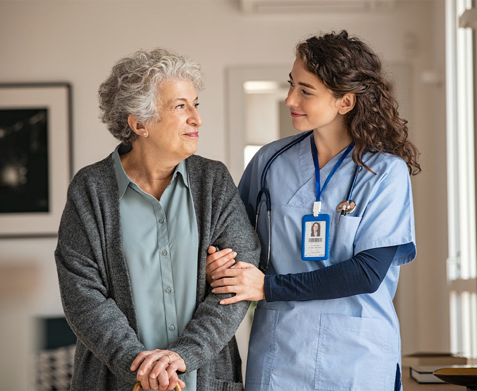 home care nurse arm in arm with senior woman in her home austin tx